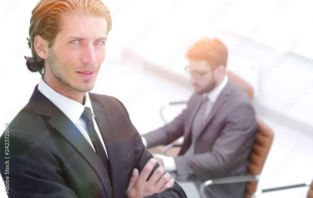 Portrait of businessman standing in office Portrait of businessman standing in office