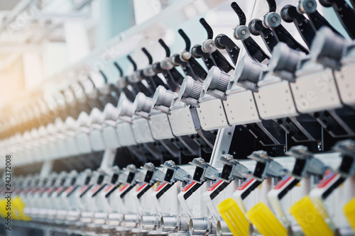 Knitted fabric. Textile factory in spinning production line and a rotating machinery and equipment production company.