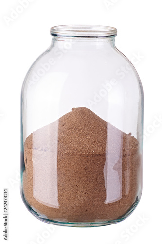 glass jar with sand on white background