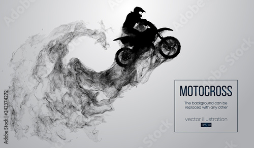 Valokuva Abstract silhouette of a motocross rider on white background from particles, dust, smoke, steam