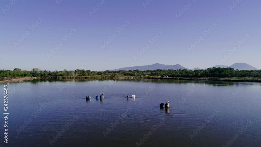 Drone travel over shrimp fishermen in Central America Drone travel over shrimp fishermen in Central America
