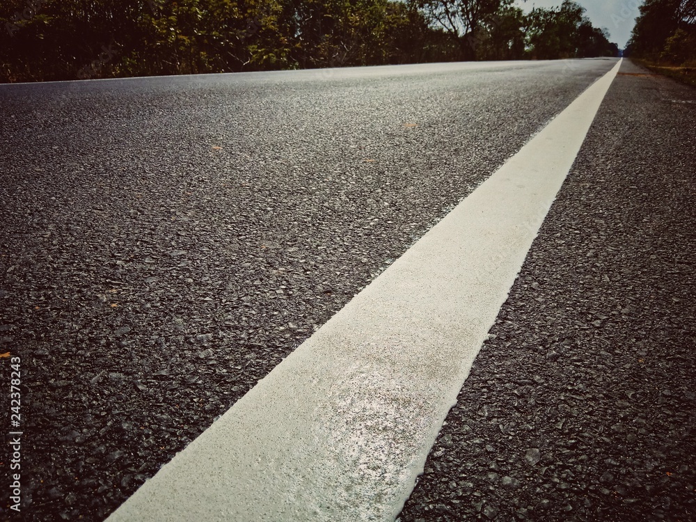 Obraz premium asphalt road with lines