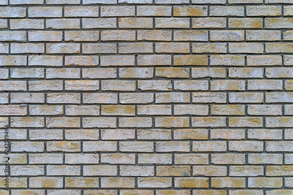 Old gray and yellow rustic brick wall - high quality texture / background Old gray and yellow rustic brick wall - high quality texture / background