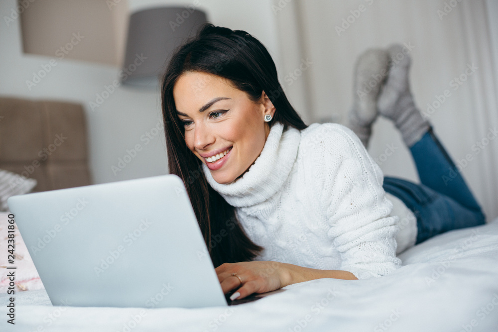 Young woman reading e-mai Young woman reading e-mai