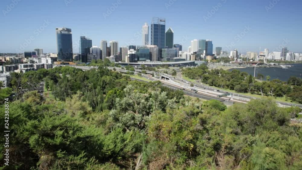 Kings Park overlooking Perth Water, a section of Swan River, and central business district of Perth from the most popular visitor destination in Western Australia. Blue sky. Perth skyline aerial view. Kings Park overlooking Perth Water, a section of Swan River, and central business district of Perth from the most popular visitor destination in Western Australia. Blue sky. Perth skyline aerial view.