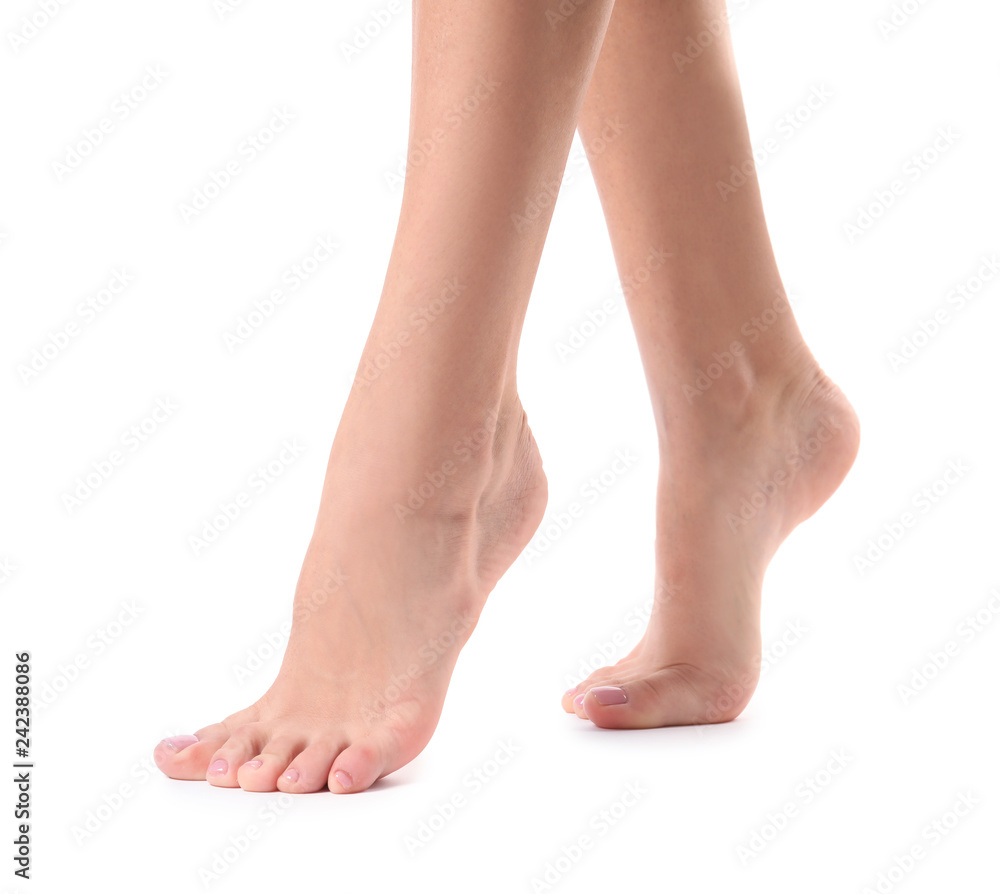 Woman with smooth feet on white background, closeup. Spa treatment Woman with smooth feet on white background, closeup. Spa treatment