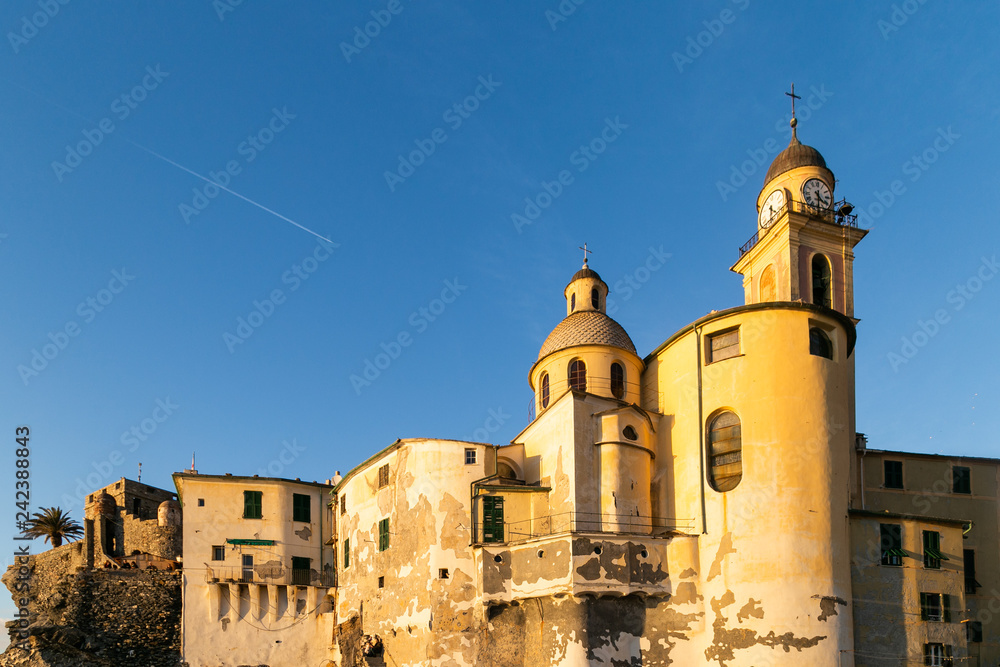 Basilica Santa Maria Assunta kissed by a warm winter sun in January. Camogli, Ligury