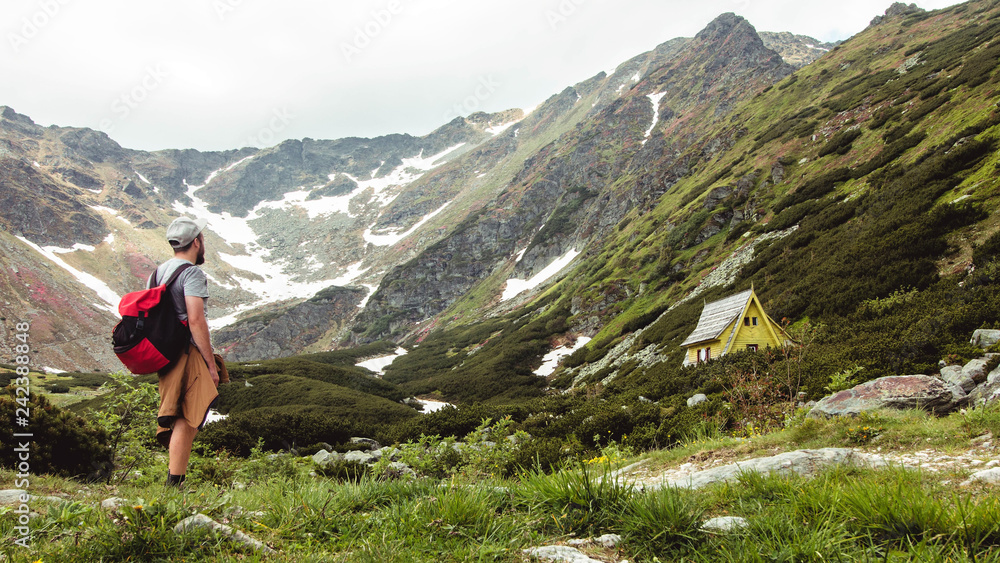 Naklejka premium Mountaineer hiking the Rodna Mountains