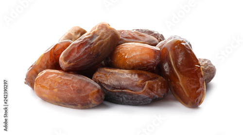 Sweet dates on white background. Dried fruit as healthy snack