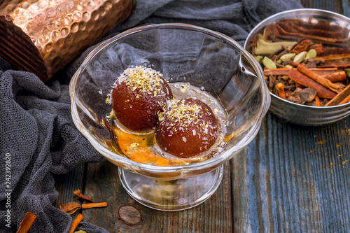 the Gulab jamun indian food on wooden background