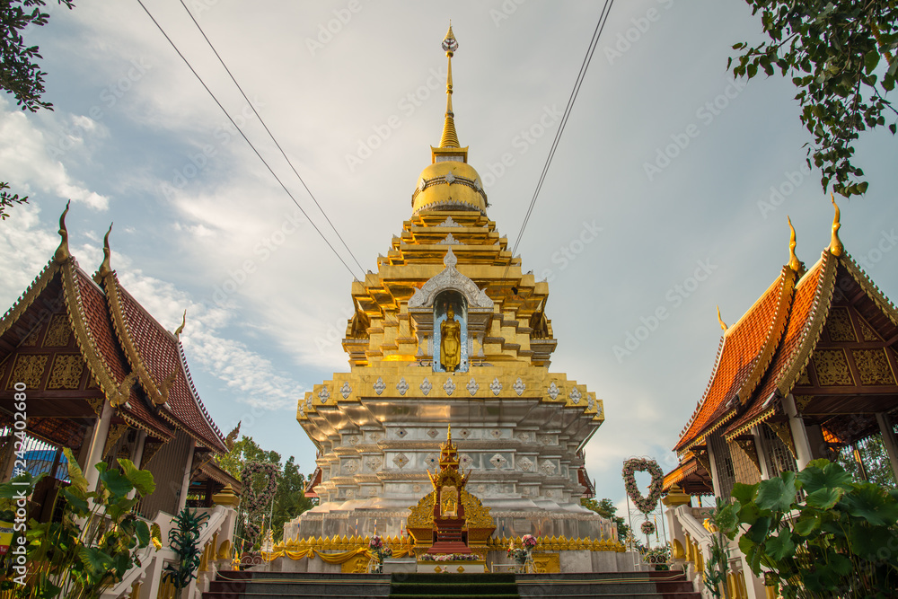 Fototapeta premium The beautiful golden pagoda of Wat Phra That Doi Saket on the small hill in Doi Saket district of Chiang Mai, Thailand.