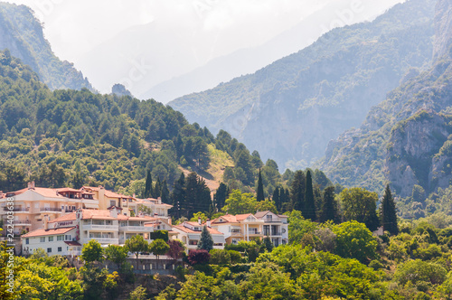 Popular touristic panoramic viewpoint on Mount Olympus from below from Litochoro town with its cozy hotels, apartments, scenic cityscape views and forest surroundings