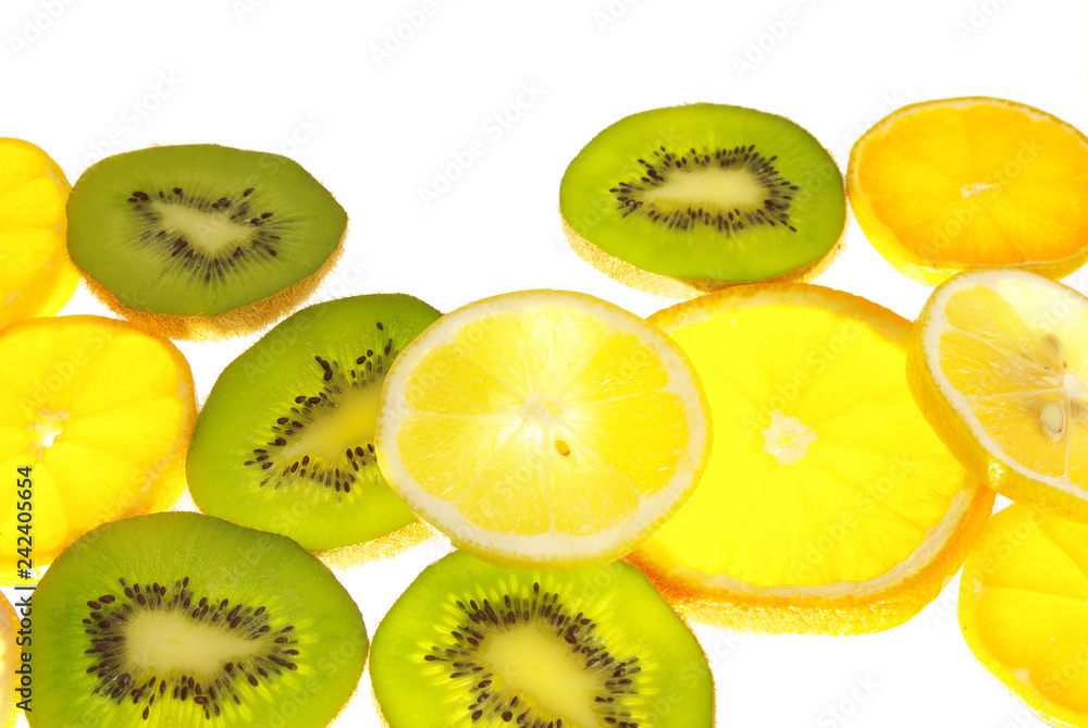 Oranges, citrons, kiwi, apples. Cut.Isolated on white Oranges, citrons, kiwi, apples. Cut.Isolated on white
