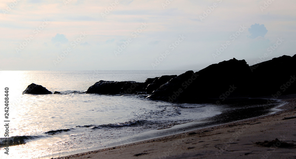 Beach Evening Looking to see the beach. Sea water rocks Beach Evening Looking to see the beach. Sea water rocks