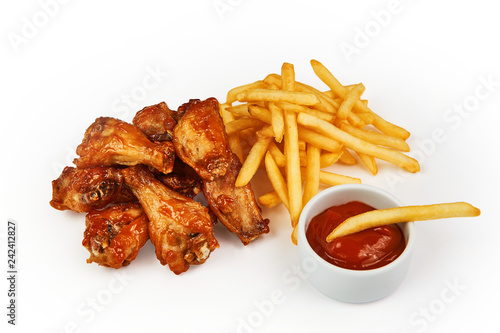 French fries, chicken and tomato sauce isolated on white with clipping path