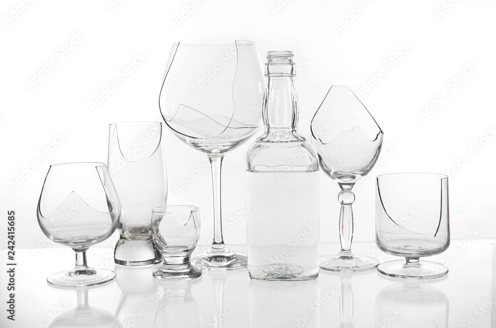 Broken wine glasses on a light background Broken wine glasses on a light background