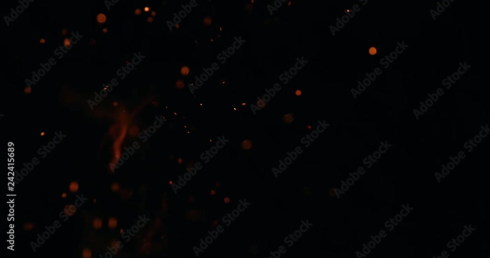Natural glowing sparks in slow motion background Natural glowing sparks in slow motion background