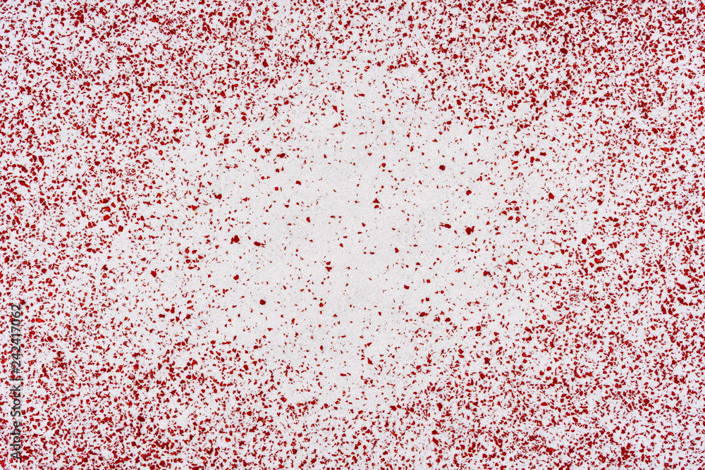 The white dust on red surface of the treadmill The white dust on red surface of the treadmill