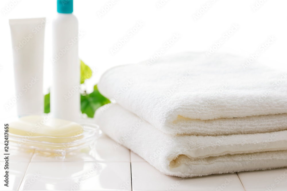 タオル Towel on the bathroom tile タオル Towel on the bathroom tile