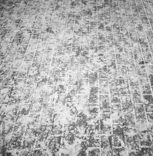 Footprints in the snow as an abstract background