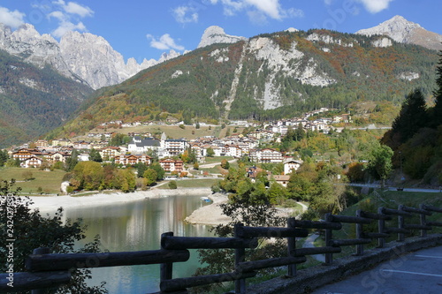 Molveno Lake and Molveno village panorama with Dolomites Mountains in the background © filippoph