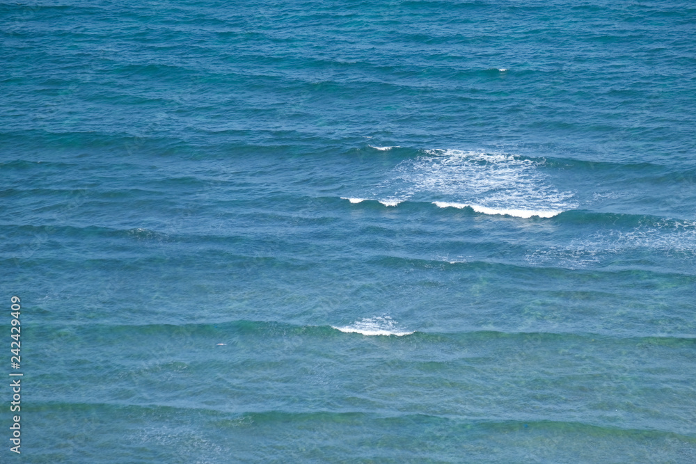 Beautiful waves in the sea, amazing nature beach background. Royalty high-quality stock photo image ocean water, sea surface, sand. Turquoise waves, clear water surface background for tex and design Beautiful waves in the sea, amazing nature beach background. Royalty high-quality stock photo image ocean water, sea surface, sand. Turquoise waves, clear water surface background for tex and design