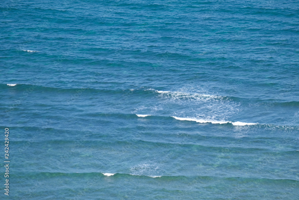 Beautiful waves in the sea, amazing nature beach background. Royalty high-quality stock photo image ocean water, sea surface, sand. Turquoise waves, clear water surface background for tex and design Beautiful waves in the sea, amazing nature beach background. Royalty high-quality stock photo image ocean water, sea surface, sand. Turquoise waves, clear water surface background for tex and design