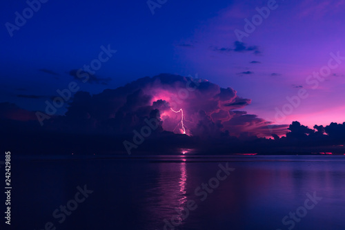 Night stormy cloudswith lightning on the sea