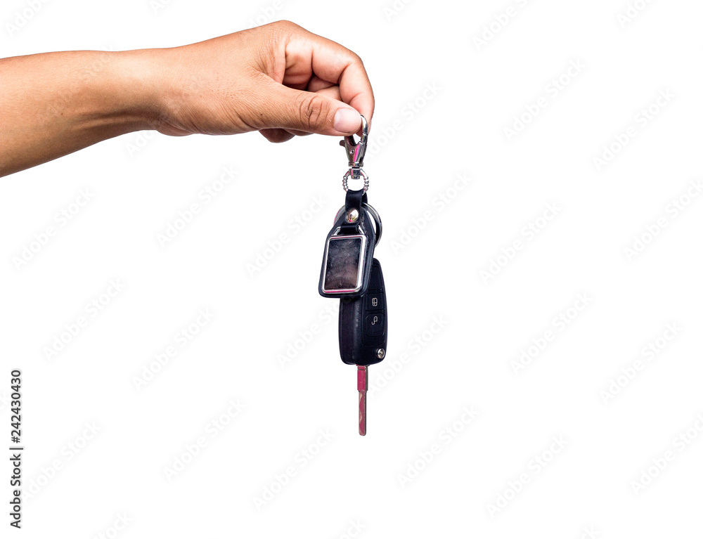 Male holding car keys, isolated on white background. Male holding car keys, isolated on white background.