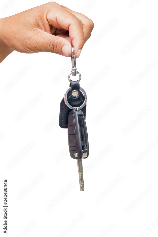 Male holding car keys, isolated on white background. Male holding car keys, isolated on white background.