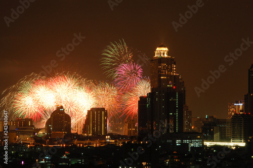 Colorful firework, skyscraper, downtown Bangkok
