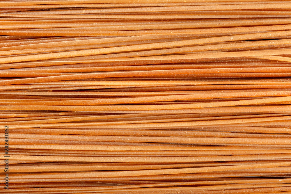 Dry buckwheat noodles texture, shot from the top. Soba background Dry buckwheat noodles texture, shot from the top. Soba background