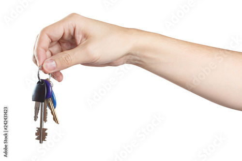 Hand holding a bunch of keys, isolated on white background