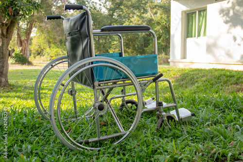 Wheelchair in the garden. © Taveesak