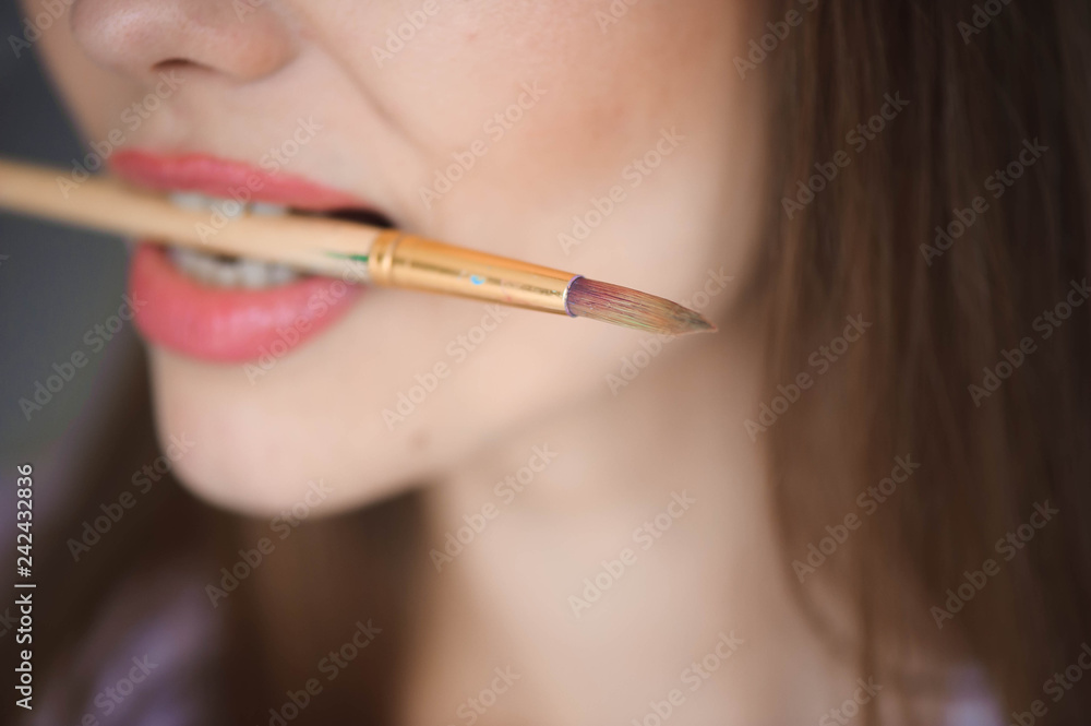 Close up view of female artist painting picture Close up view of female artist painting picture
