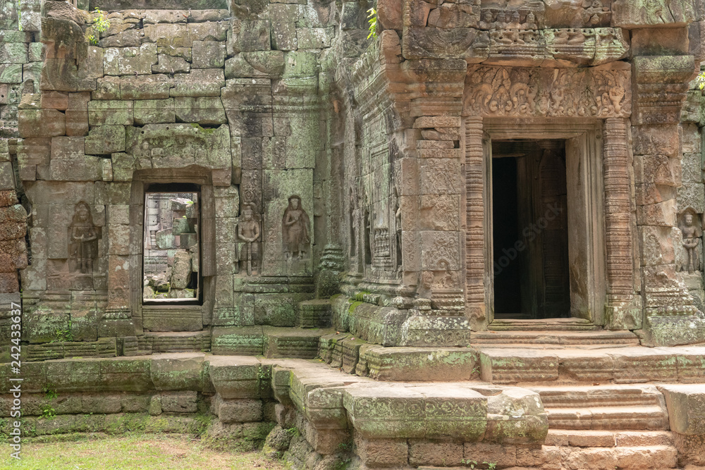 Decorated doorway and bas-reliefs at Ta Som Decorated doorway and bas-reliefs at Ta Som