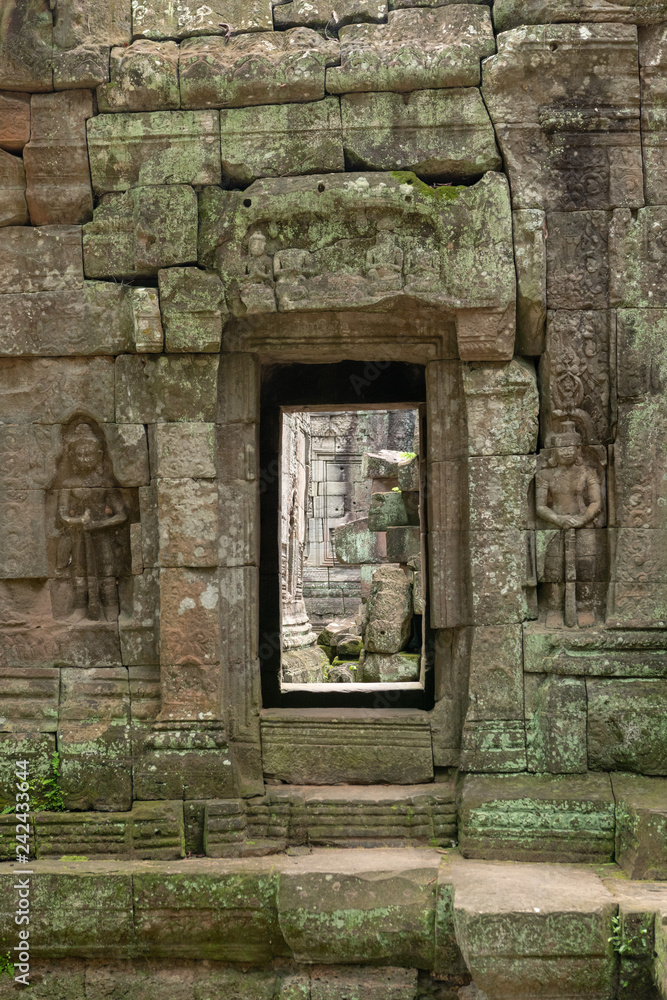 Decorated entrance and bas-reliefs at Ta Som