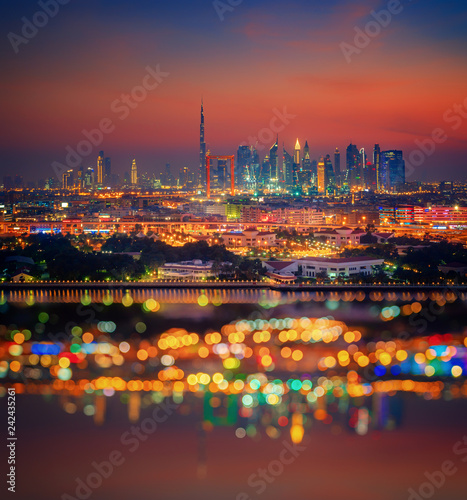 Obraz na płótnie Beautiful skyline of Dubai city at night in United Arab Emirates w salonie