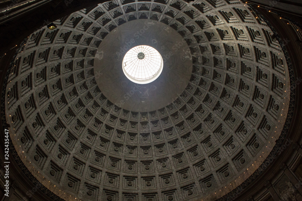 Coffered ceiling of dome of the San Francesco di Paola church in Naples, Italy. It is located at the west side of Piazza del Plebiscito. The church is reminiscent of the Pantheon in Rome. Coffered ceiling of dome of the San Francesco di Paola church in Naples, Italy. It is located at the west side of Piazza del Plebiscito. The church is reminiscent of the Pantheon in Rome.