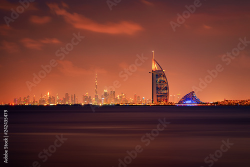 Photography Beautiful skyline of Dubai city at night in United Arab Emirates