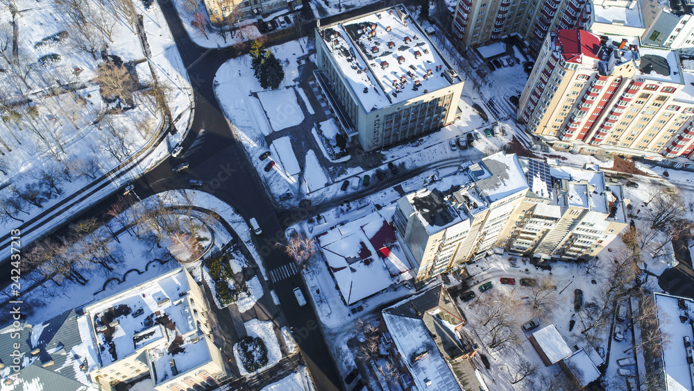 winter city pano with lot of houses and snow showed from drone , aerial photo 