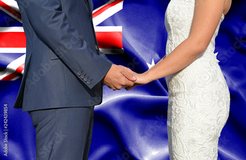 Wallpaper Mural Husband and Wife holding hands - Conceptual photograph of marriage in Australia Torontodigital.ca