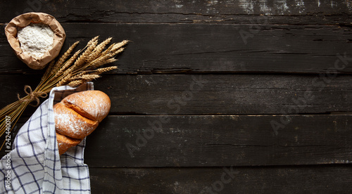 Still life with bread, flour and spikelets