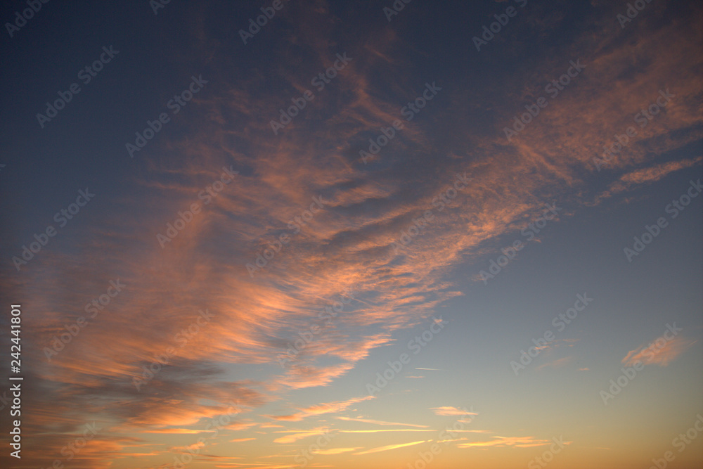 sunset in the sky,clouds,orange,cloudscape,evening,color,blue