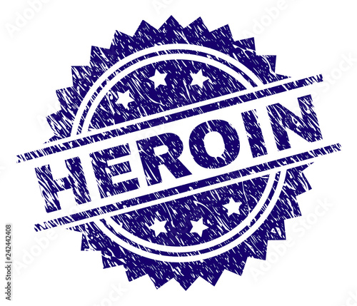 HEROIN stamp seal watermark with distress style. Blue vector rubber print of HEROIN tag with grunge texture.