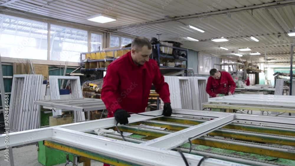 Install rubber sealant in plastic windows and doors. Manual worker assembling PVC doors and windows. Rubber gasket in plastic windows. Rubber Insulation for windows and doors. Install rubber sealant in plastic windows and doors. Manual worker assembling PVC doors and windows. Rubber gasket in plastic windows. Rubber Insulation for windows and doors.