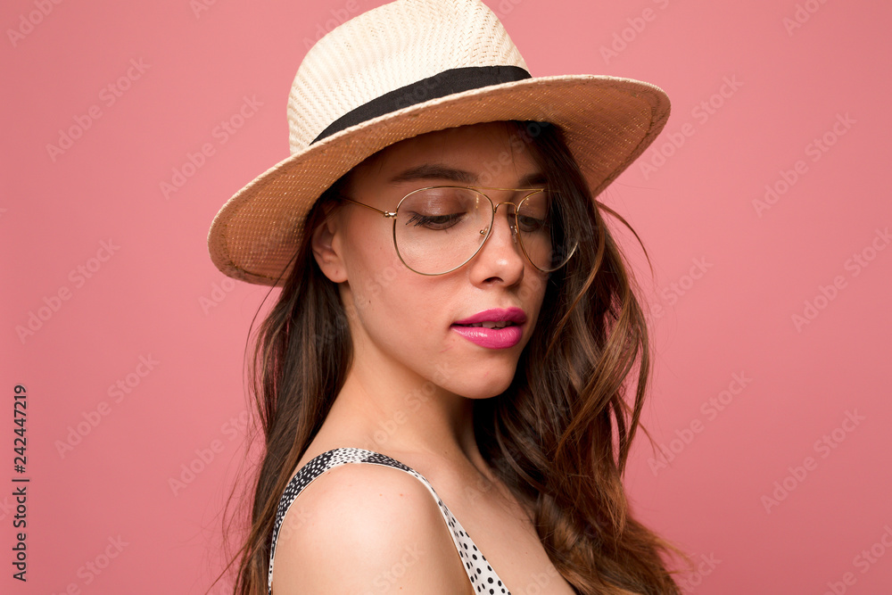 Wonderful female model posing with closed eyes and happy true smile on pink background. Beautiful female half-length portrait. Young emotional woman. The human emotions, facial expression concept Wonderful female model posing with closed eyes and happy true smile on pink background. Beautiful female half-length portrait. Young emotional woman. The human emotions, facial expression concept