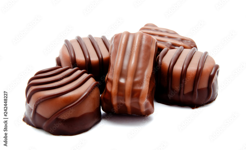 Fototapeta premium Assortment of chocolate candies sweets isolated