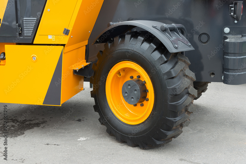 Big truck wheel of the large construction vehicle Big truck wheel of the large construction vehicle