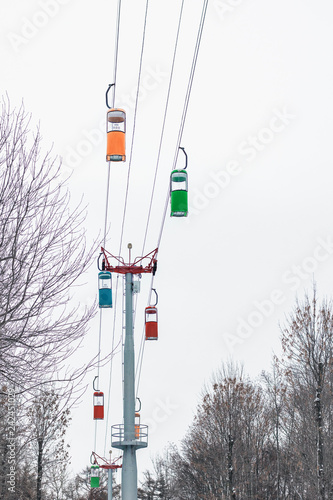 Group of cable cars in the air, winter season photo